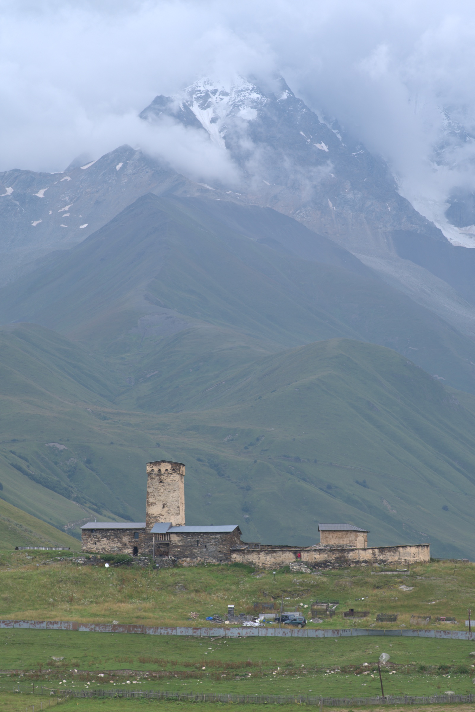 Ushguli tower in green meadow, Svaneti, Georgia